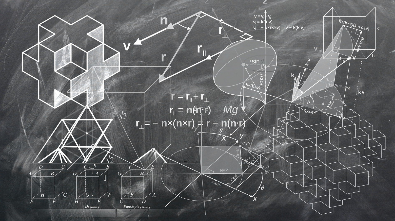 Wzory i figury geometryczne narysowane kredą na tablicy
